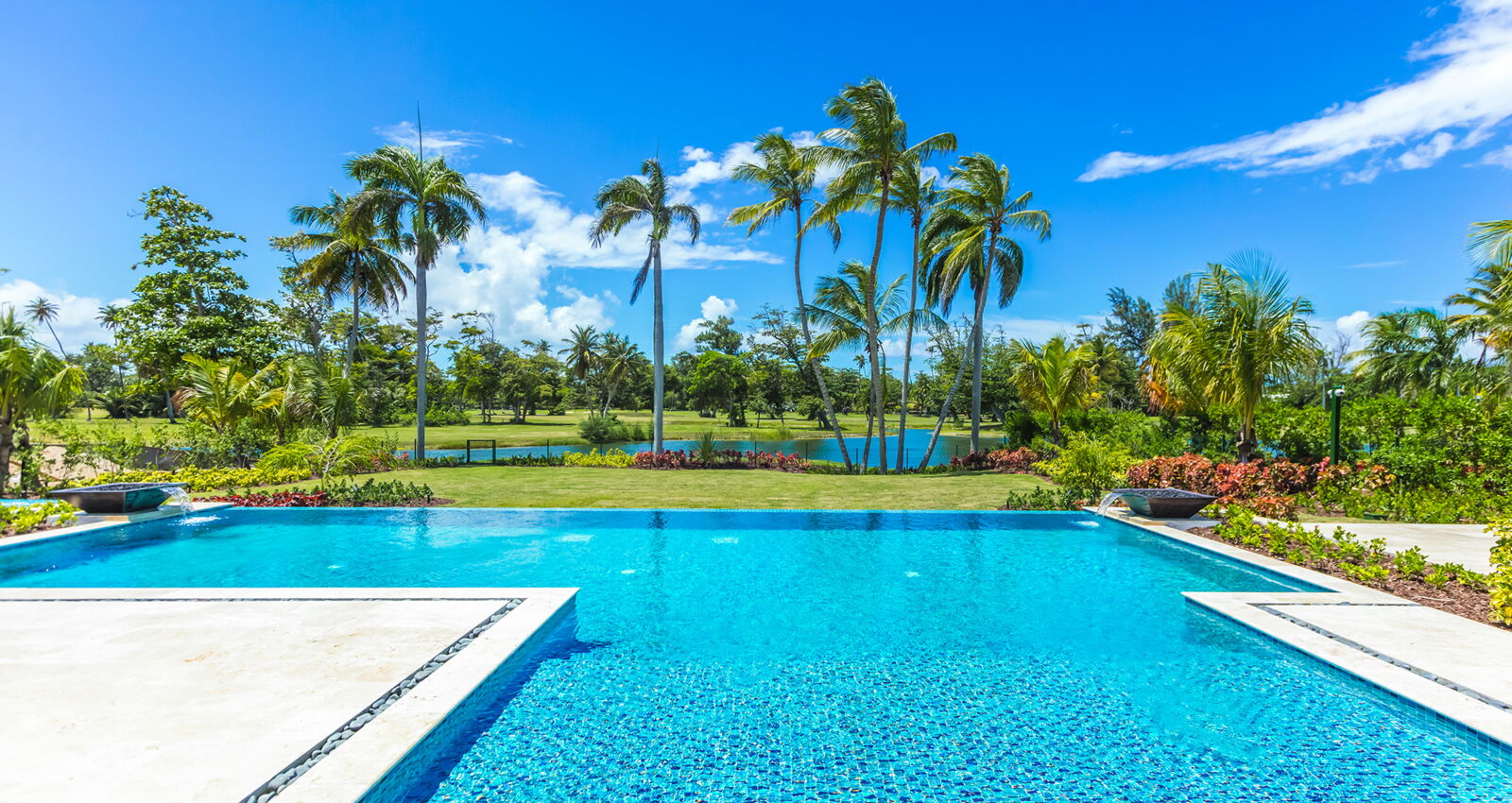 Ritz-Carlton Reserve East Beach Residence estate pool overlooking waterfront and golf course